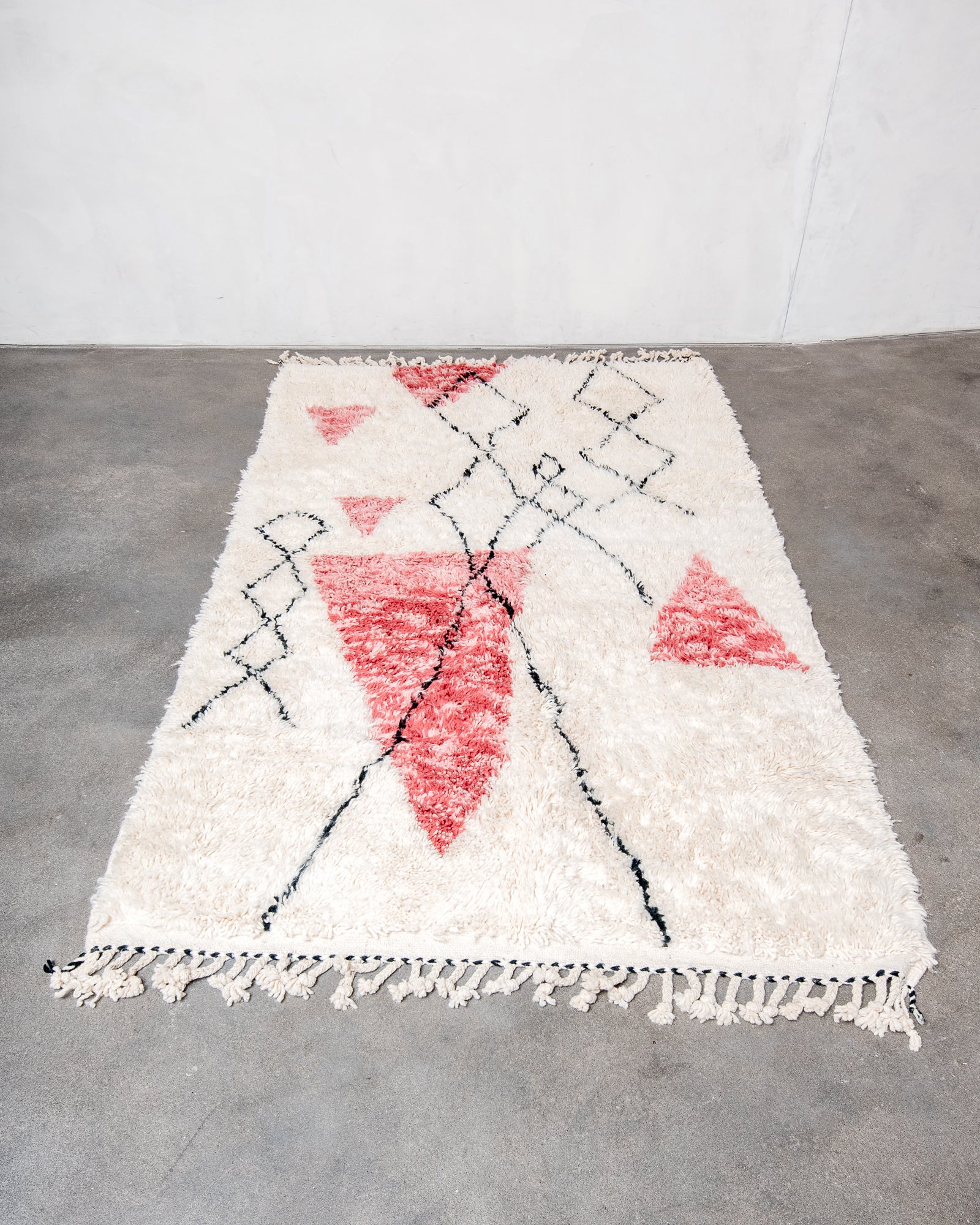 Modern, designer, handcrafted Berber rug from Morocco. Beniourain carpet with minimalist design, natural wool pile and a fluffy texture.